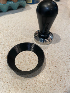3D Printed dosing ring next to a THIRTY calibrated coffee tamp